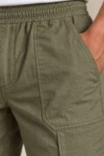 Olive Linen Utility Trousers front pocket and linen cotton texture