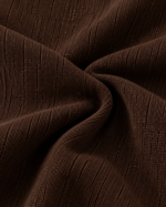 Close-up of espresso brown men’s polo showing the collar and textured knit fabric