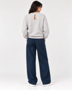 Back view of light grey sweatshirt showing the distinctive keyhole opening and horizontal seam
