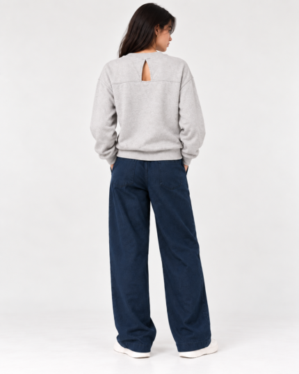 Back view of light grey sweatshirt showing the distinctive keyhole opening and horizontal seam