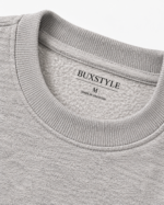 Close-up of keyhole back sweatshirt showing the open-back detail and horizontal seam