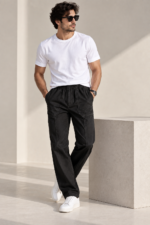 Male model wearing Black Linen Utility Trousers