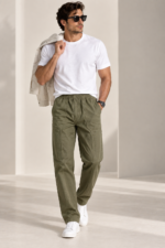 Male model wearing Olive Linen Utility Trousers