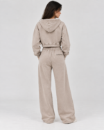 Front view of women’s stone acid wash cropped zip hoodie and relaxed baggy sweatpants set