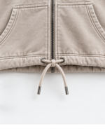 Detail view of women’s stone acid wash baggy sweatpants with elasticated waistband and relaxed fit